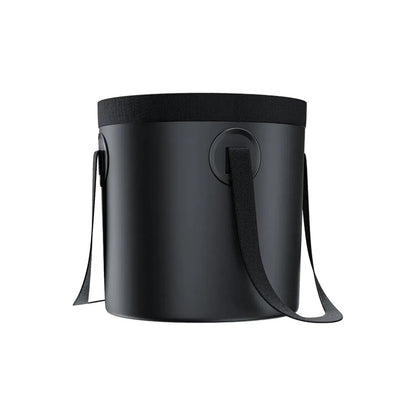 Black bucket bag of Green Lion Portable Camping Shower with a strap on a white background