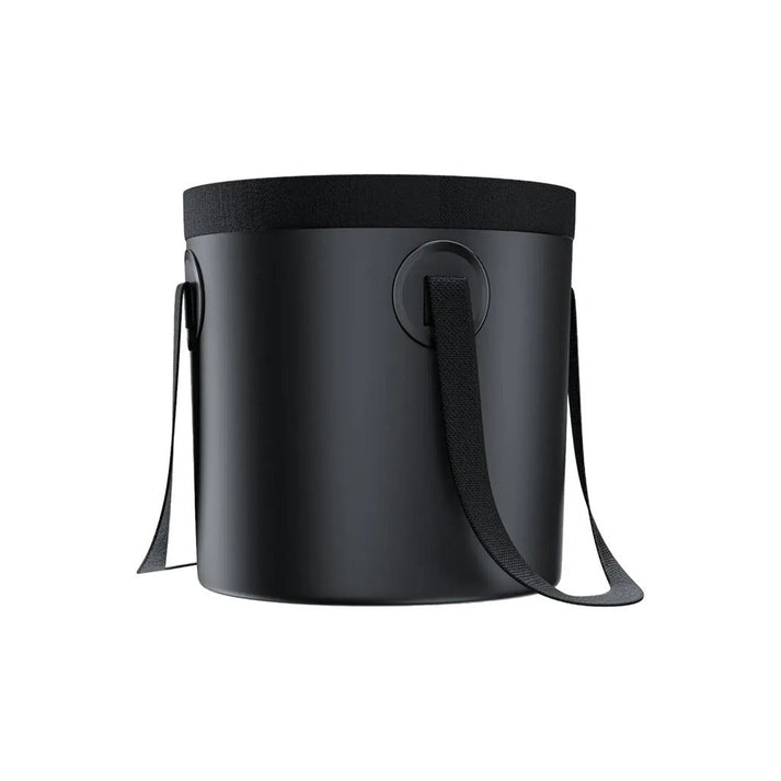 Black bucket bag of Green Lion Portable Camping Shower with a strap on a white background