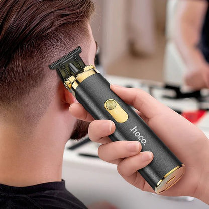 Hoco HP22 Retro Electric Hair Clipper – Black & Gold Precision Trimmer for Hair & Beard - Saif Al Najmi KwMens GroomingHocoSaif Al Najmi KwHoco HP22 Retro Electric Hair Clipper – Black & Gold Precision Trimmer for Hair & Beard - Saif Al Najmi Kw