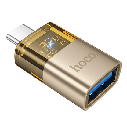 Hoco UA36B USB - C / Type - C Male to USB Female OTG Transparent Adapter – Gold - Saif Al Najmi KwOTG/ConnectorsHocoSaif Al Najmi KwHoco UA36B USB - C / Type - C Male to USB Female OTG Transparent Adapter – Gold